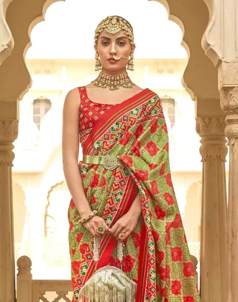 Image of Mehendi Green Geometric Print Patola Butta Saree