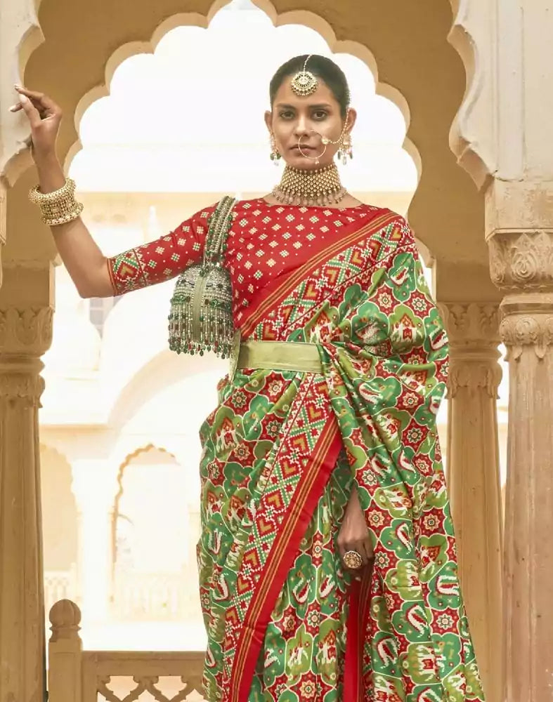 Image of Dark Green Ikat Print Patola Fancy Saree