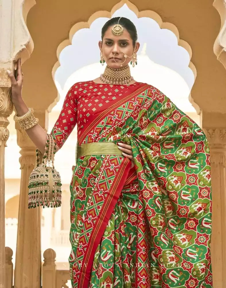 Image of Dark Green Ikat Print Patola Fancy Saree