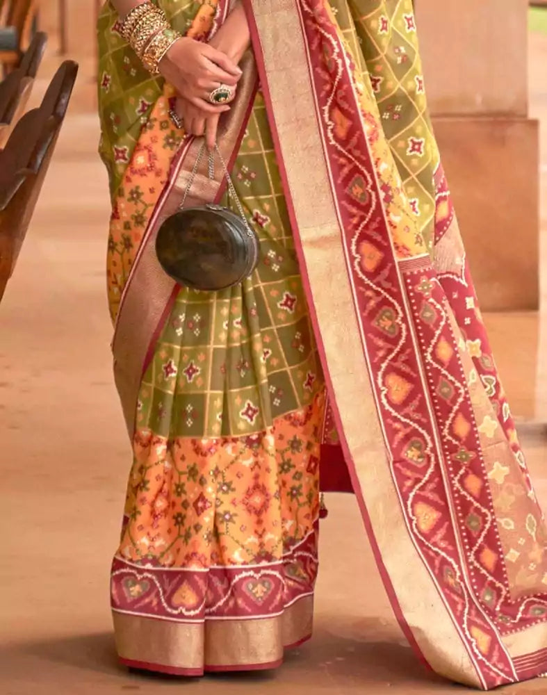 Image of Light Mehendi Green Ikat Print Patola Saree