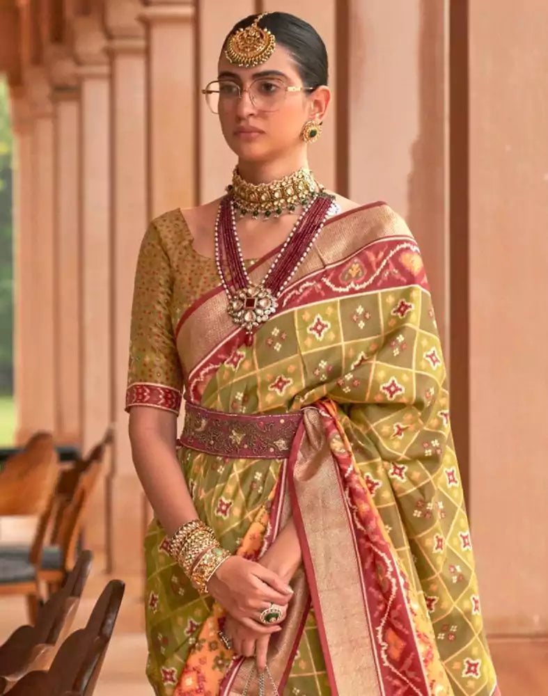 Image of Light Mehendi Green Ikat Print Patola Saree