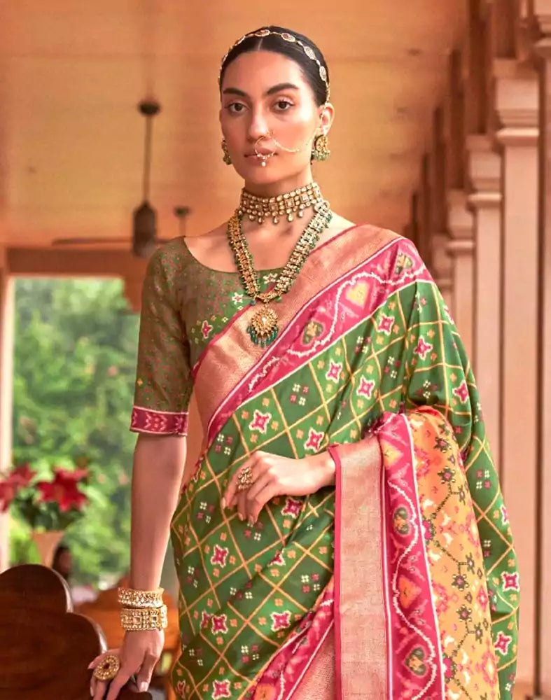 Image of Trending Green Ikat Print Patola Saree