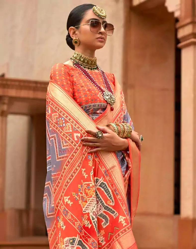 Image of Grey and Orange Chevron Pattern Print Patola Saree