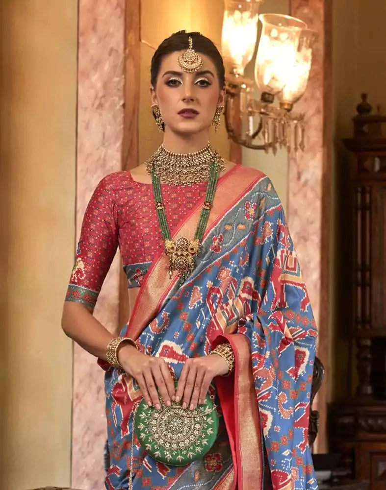 Image of Patola Fabric Blue Coloured Ikat Print Saree
