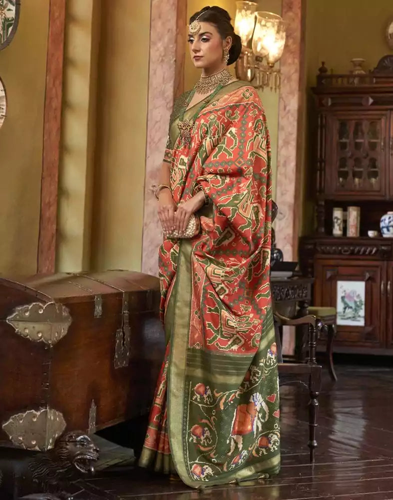 Image of Orange Ikat Print Patola Fancy Saree