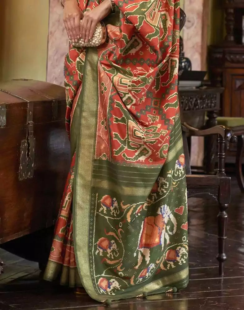 Image of Orange Ikat Print Patola Fancy Saree