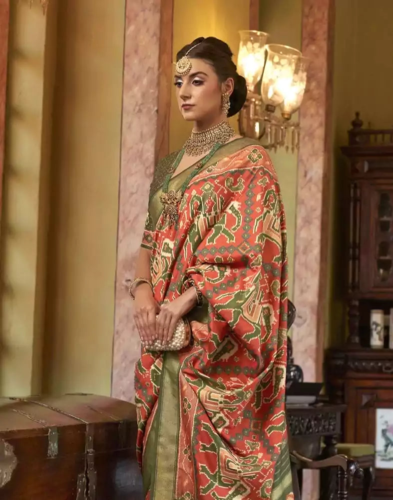 Image of Orange Ikat Print Patola Fancy Saree