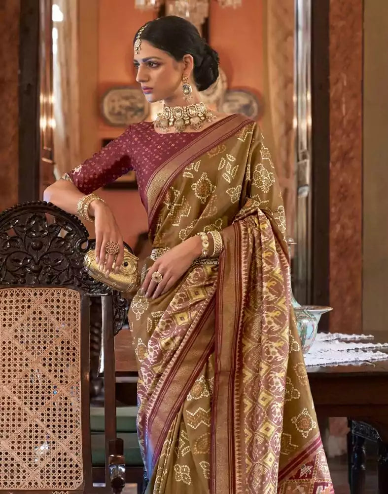 Image of Brown Ikat Print Patola Silk Saree