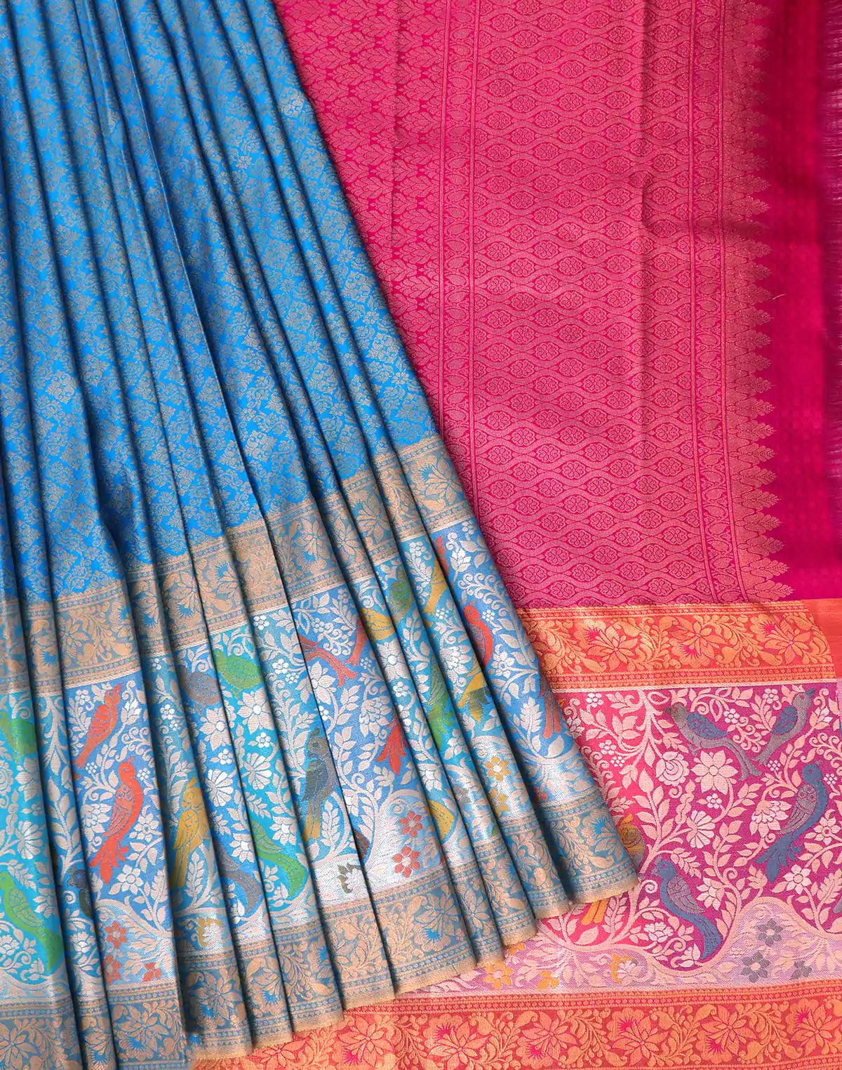 Image of Kanchi Pattu Saree in Sky Blue Color and Pink combination Blouse