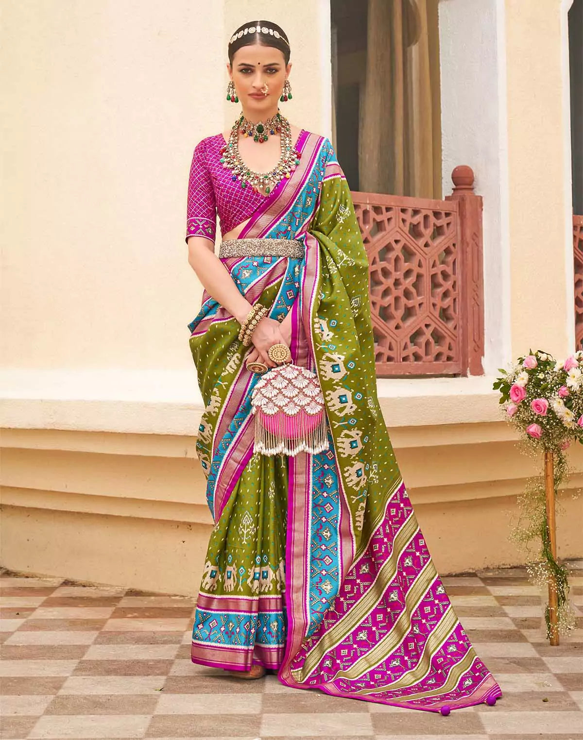 Image of Elegant Patola Silk Green Saree