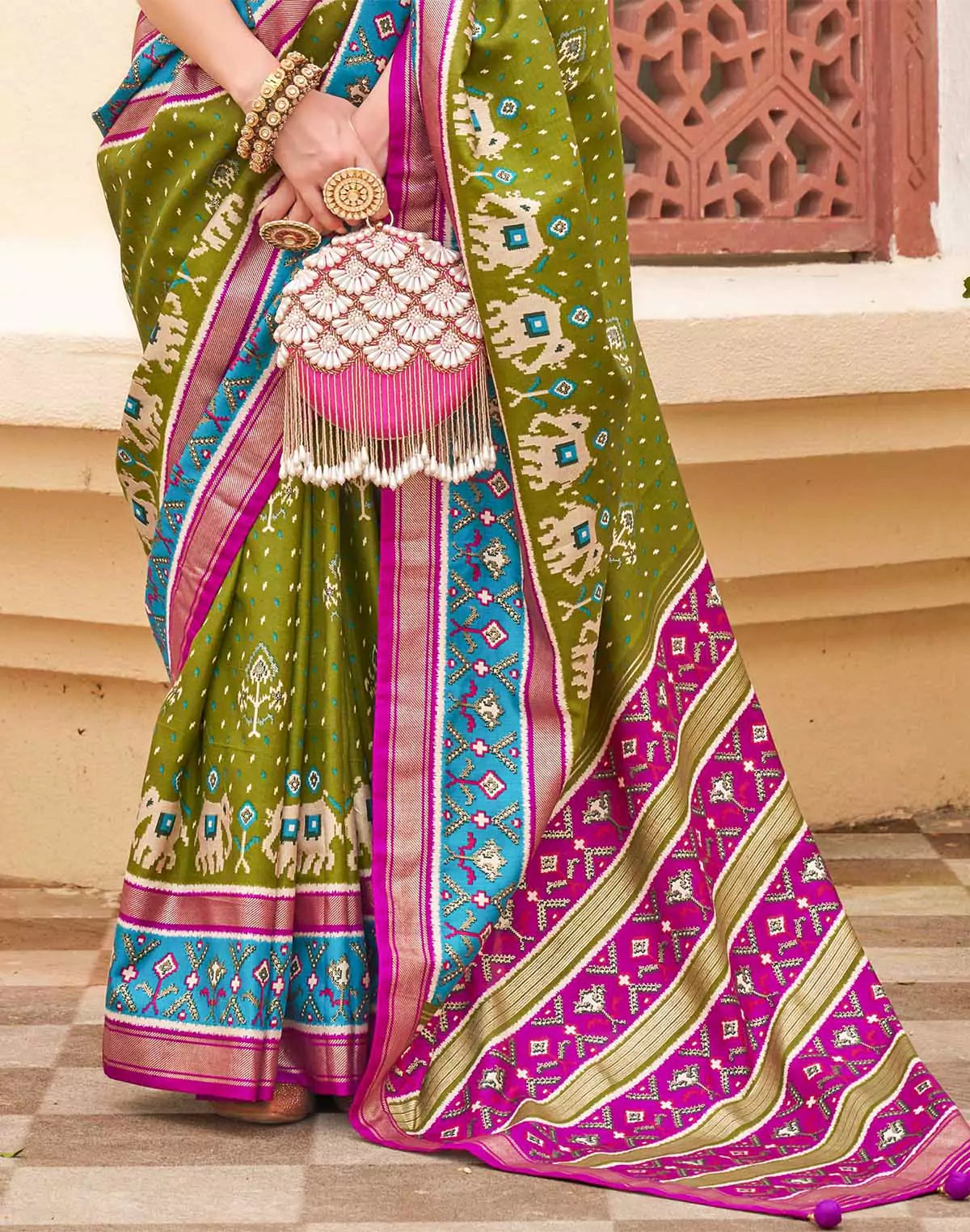 Image of Elegant Patola Silk Green Saree