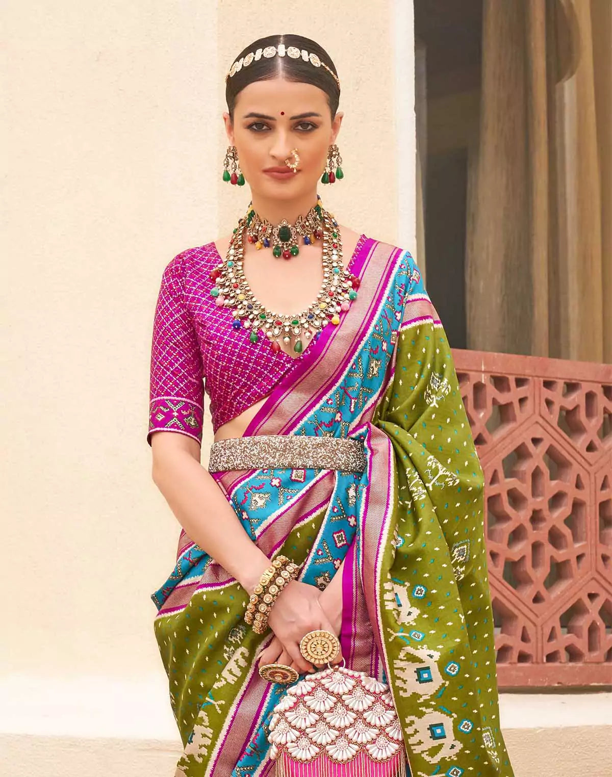 Image of Elegant Patola Silk Green Saree