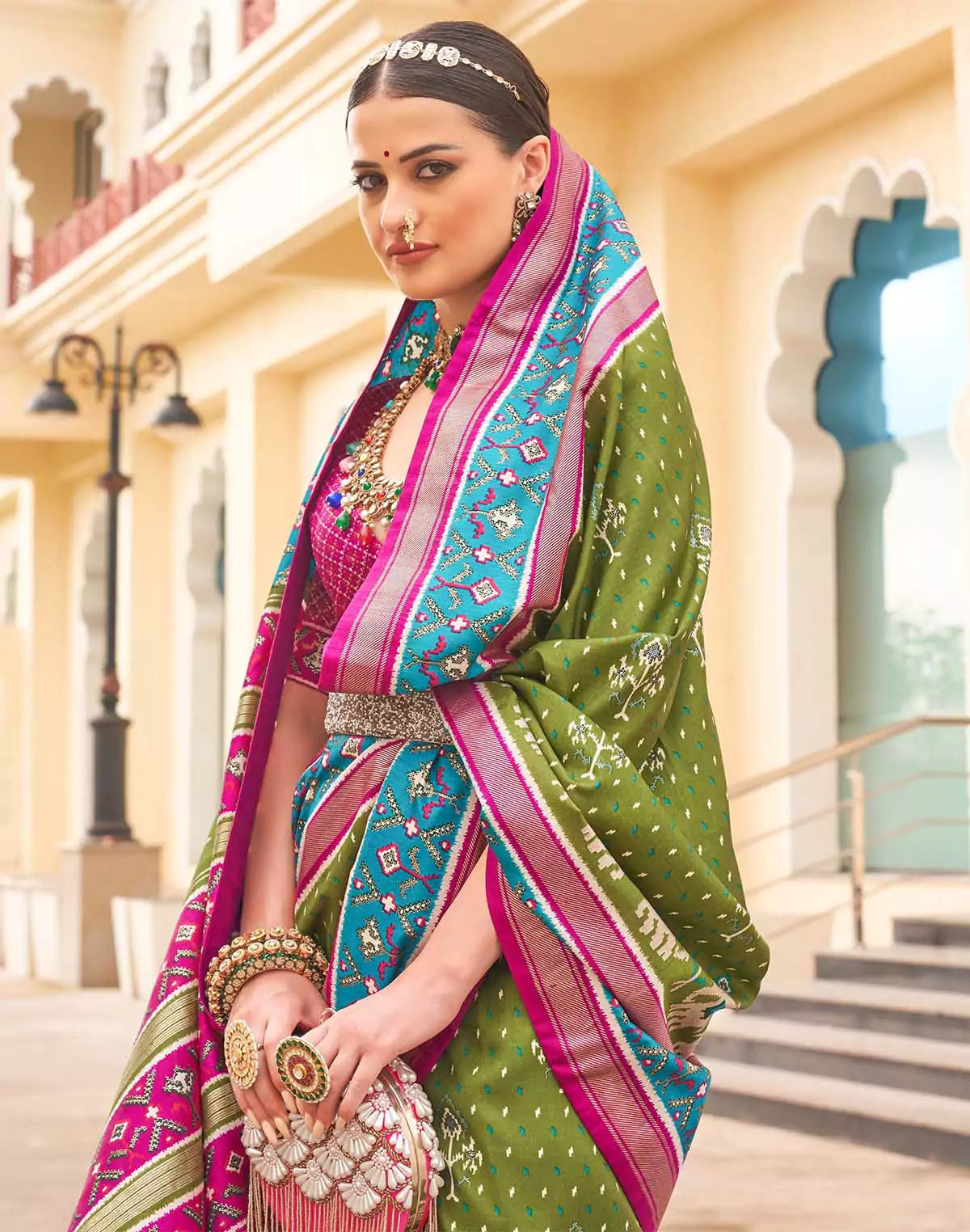 Image of Elegant Patola Silk Green Saree
