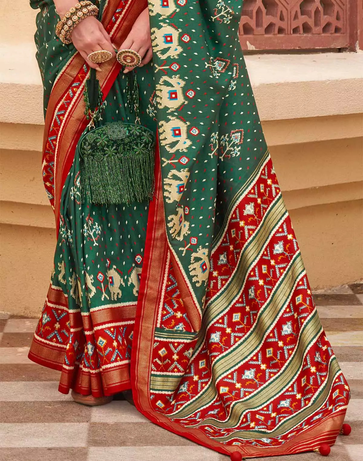 Image of Green Coloured Contrast Border Palkhi Patola Saree