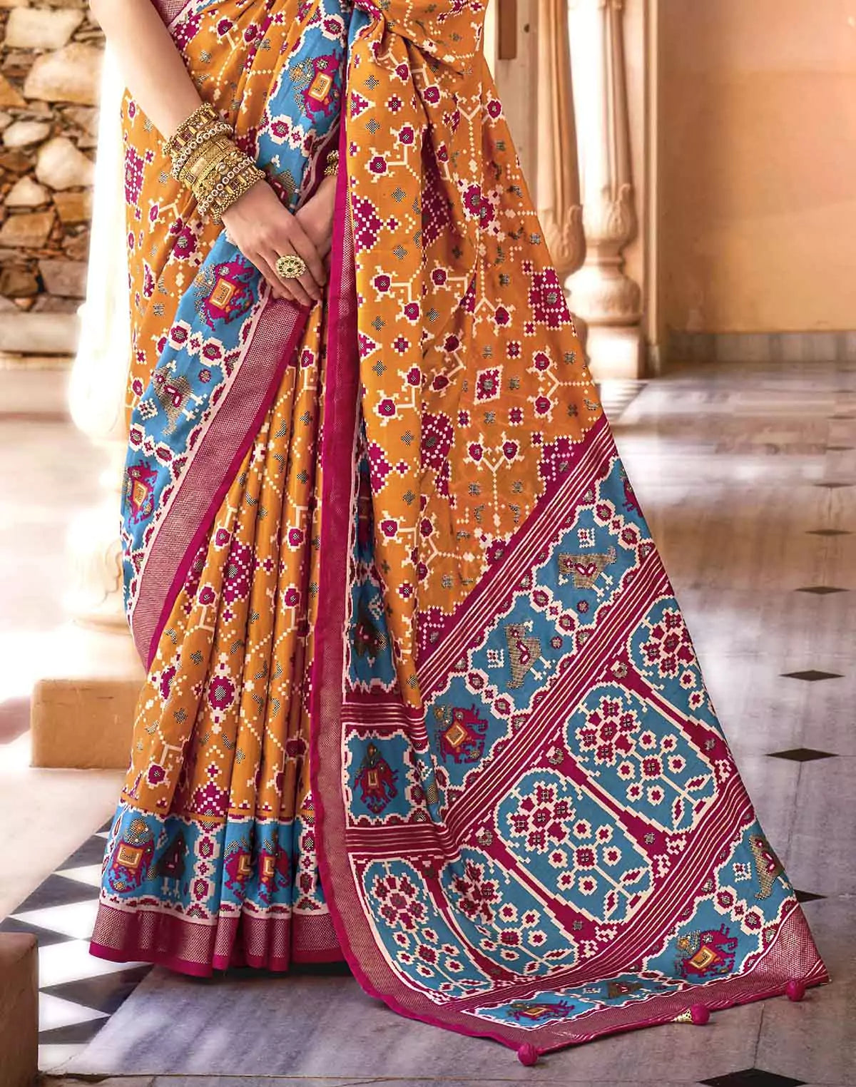 Image of Mustard and Pink Woven Patola Saree
