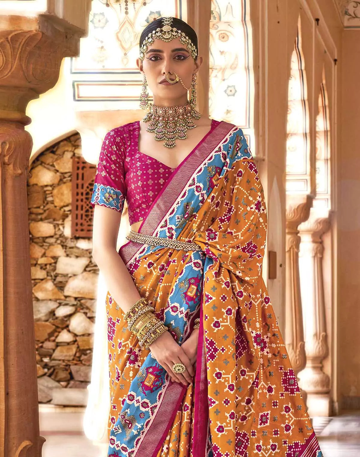 Image of Mustard and Pink Woven Patola Saree