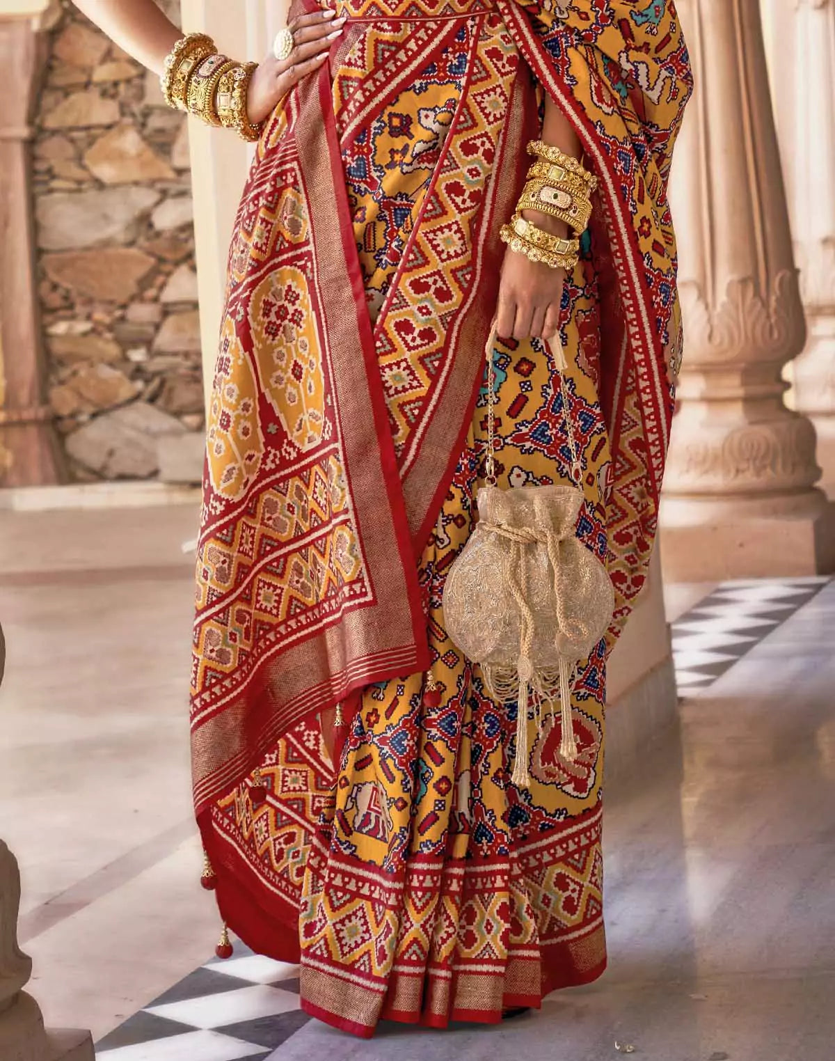 Image of Mustard Ikat smooth Patola Fancy Saree