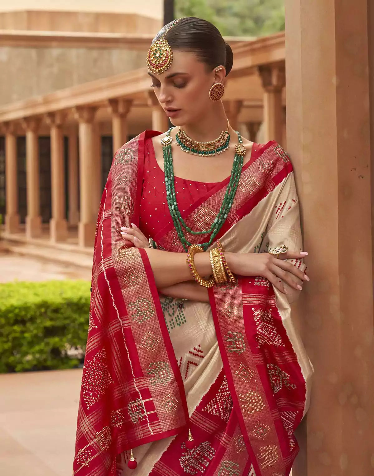 Image of Cream Coloured Patola Silk Mirror work Saree