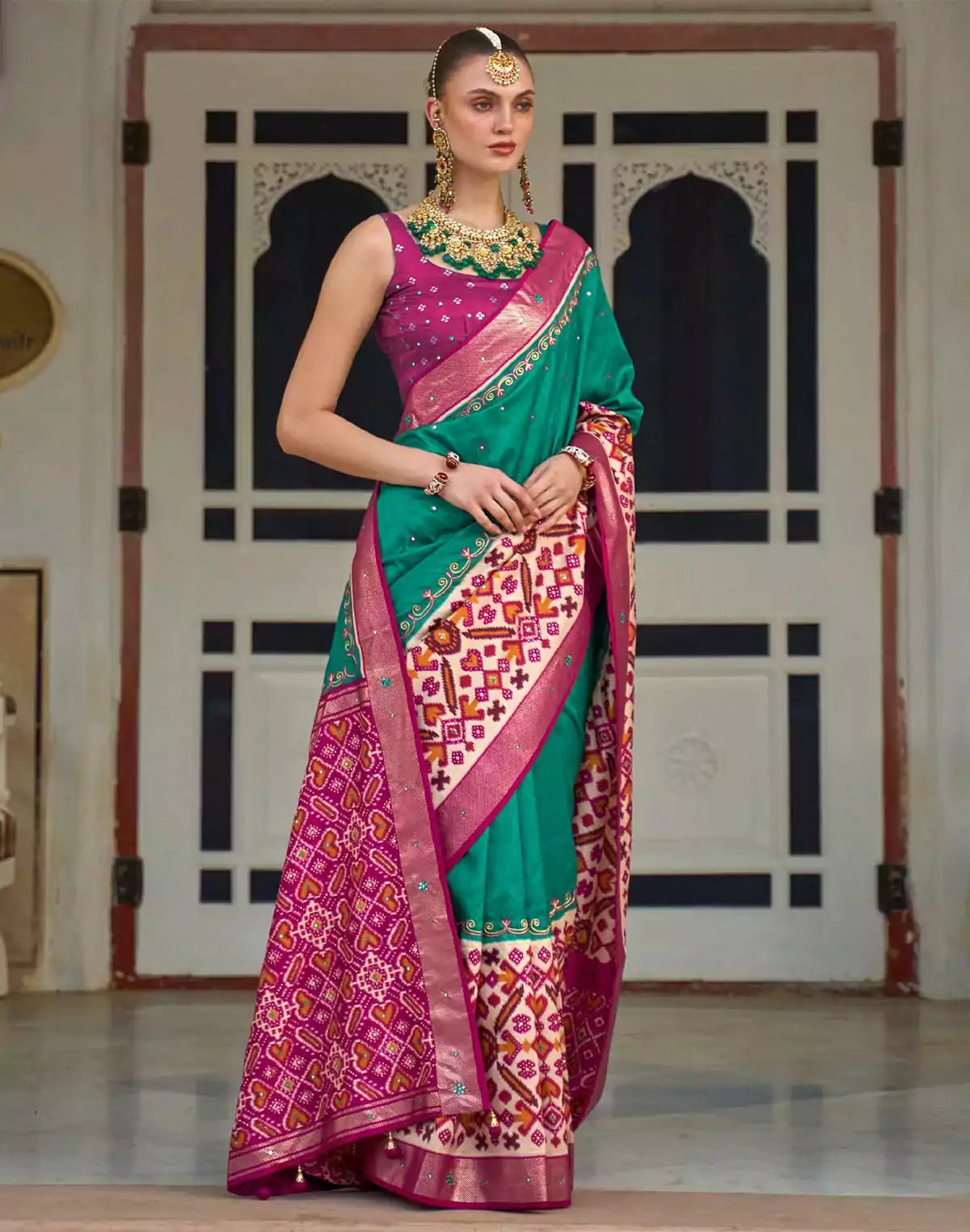 Image of Sea Green Patola Silk Mirror work Saree