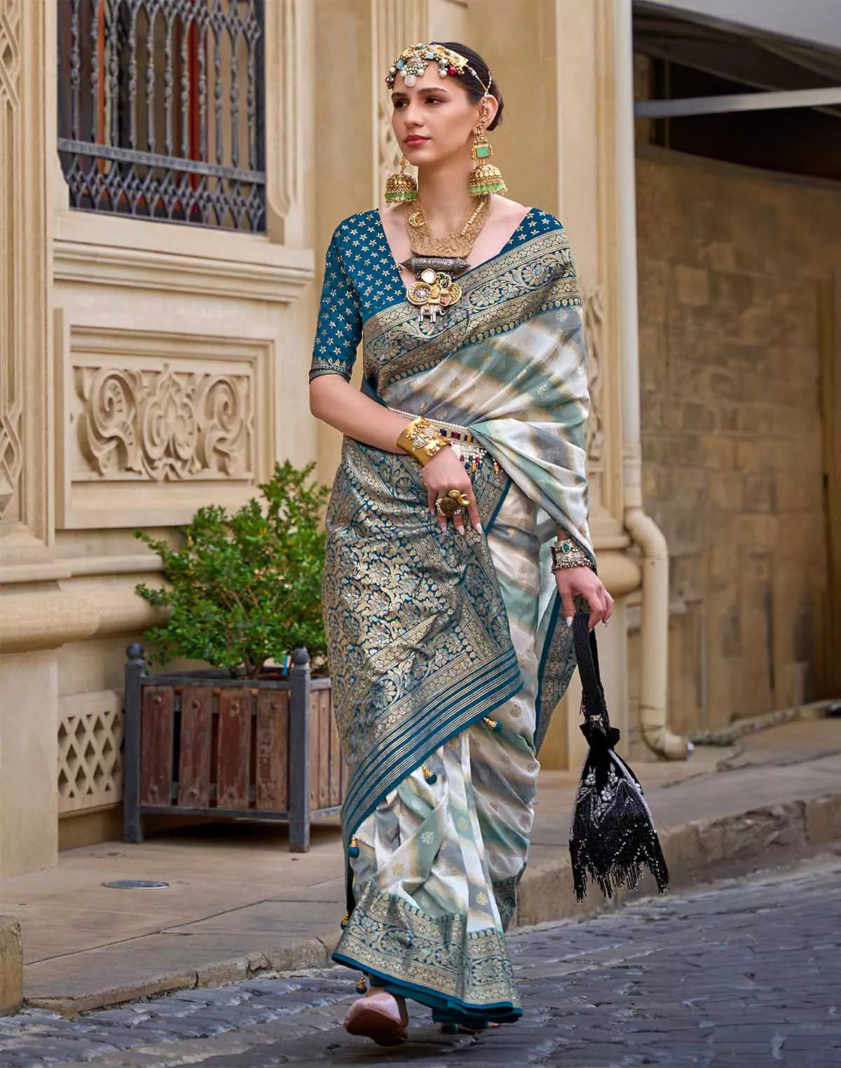 Image of Peacock Blue elegant Banaras Border Goergette Saree