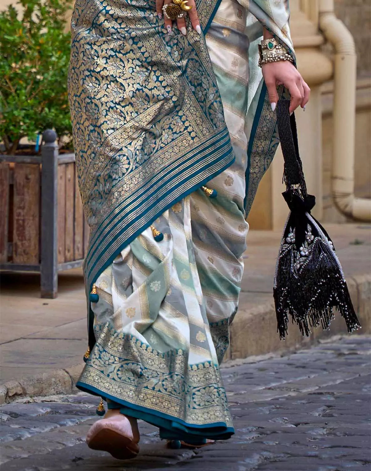 Image of Peacock Blue elegant Banaras Border Goergette Saree