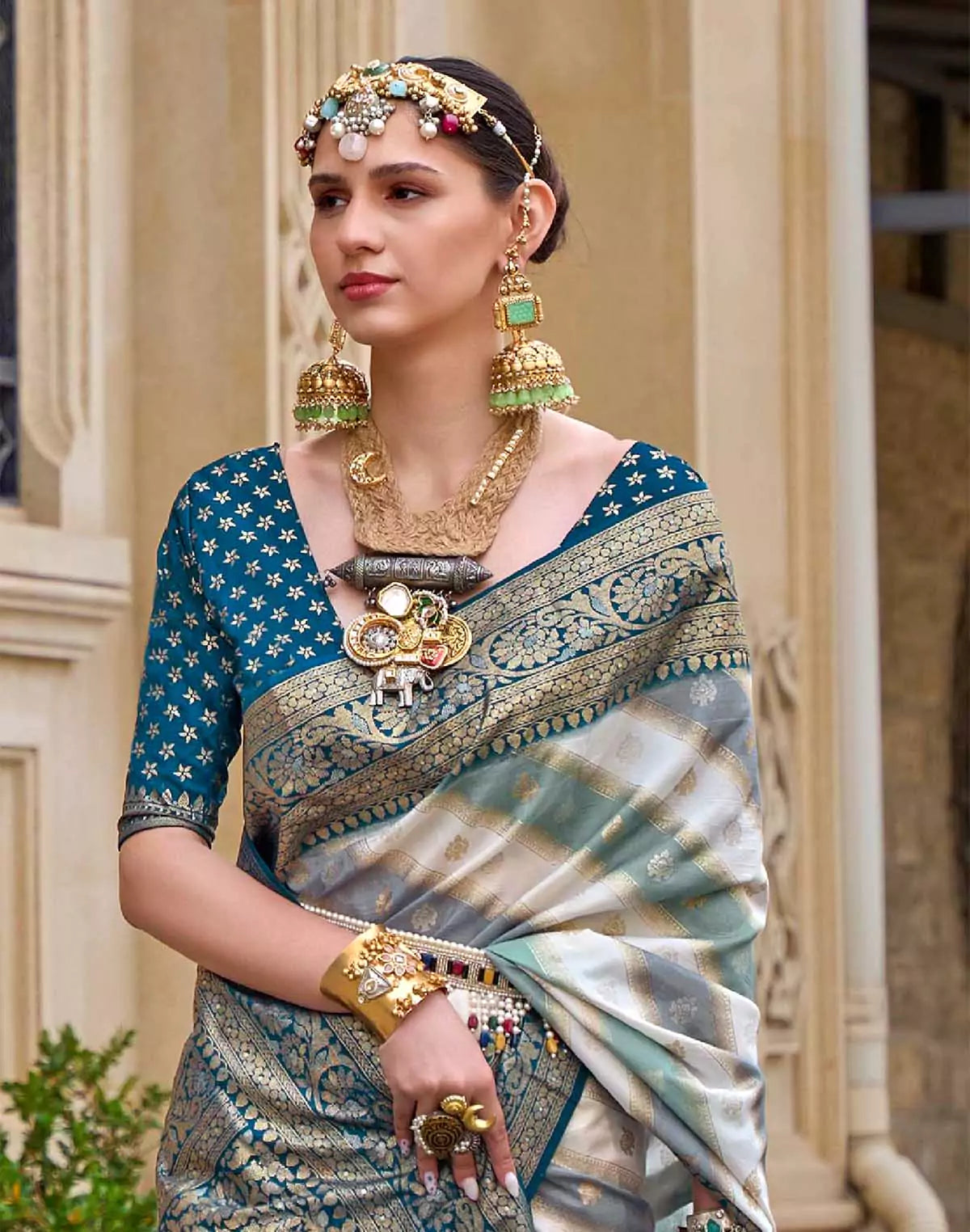 Image of Peacock Blue elegant Banaras Border Goergette Saree