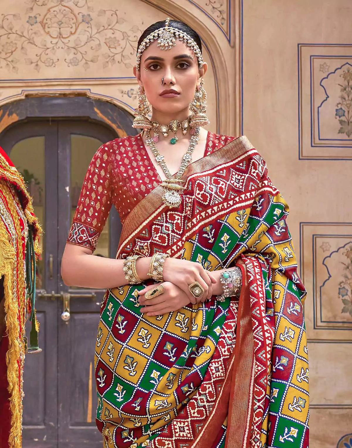 Image of Mustard Ikat Print Patola Silk Saree