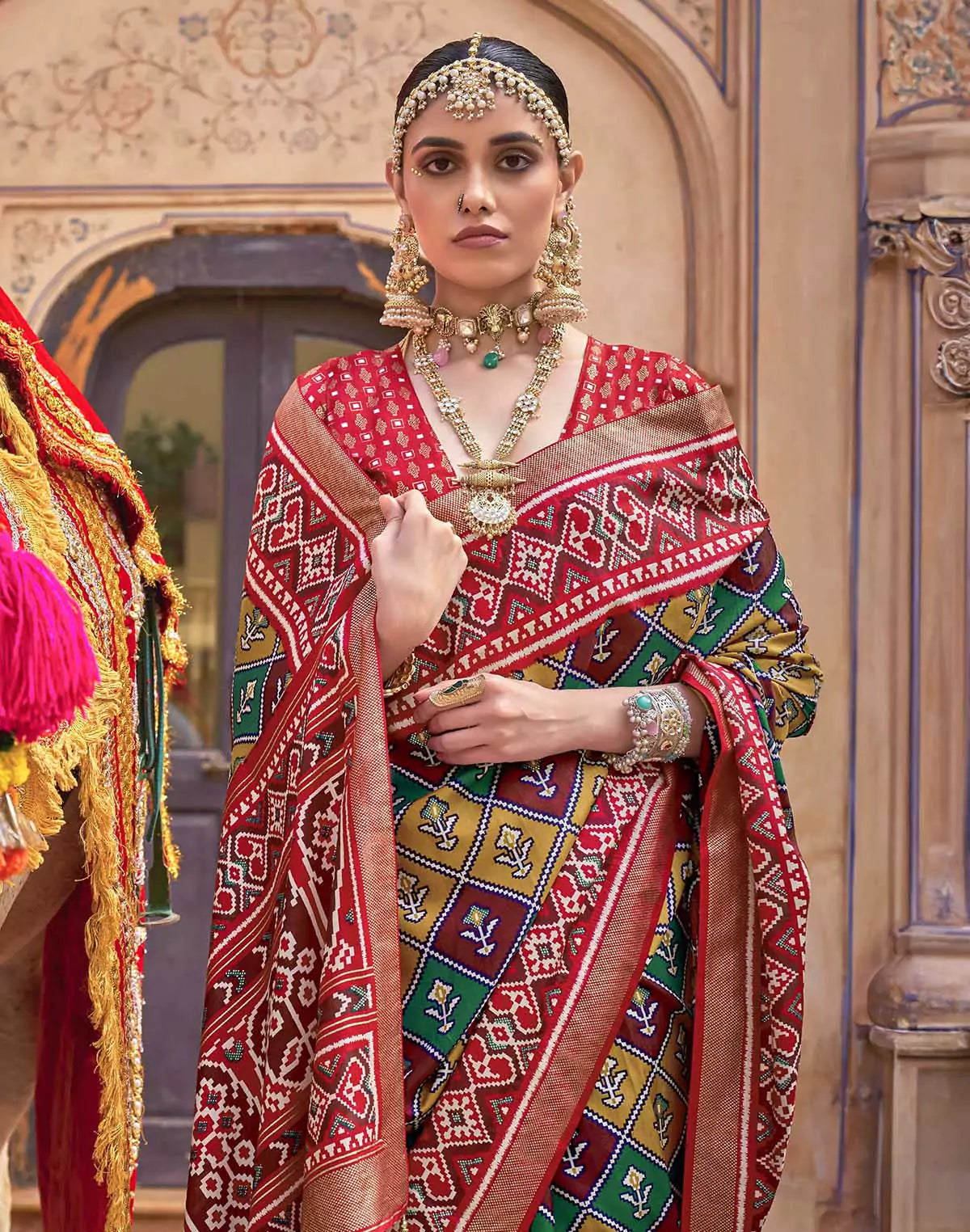 Image of Mustard Ikat Print Patola Silk Saree