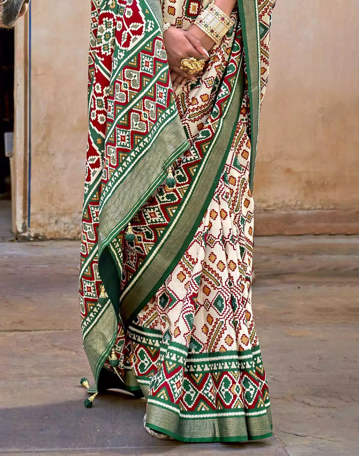 Image of Green Ikat Patola Silk Saree with Unstitched Blouse