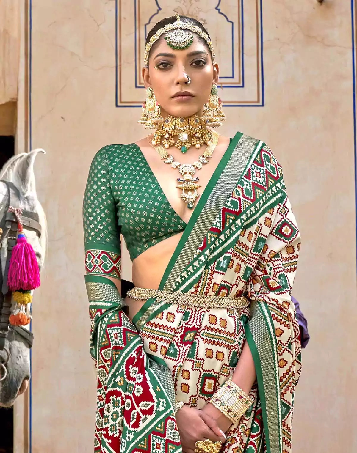 Image of Green Ikat Patola Silk Saree with Unstitched Blouse