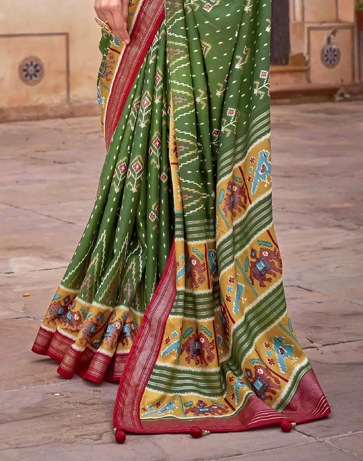Image of Dark Green smooth fabric Patola Saree