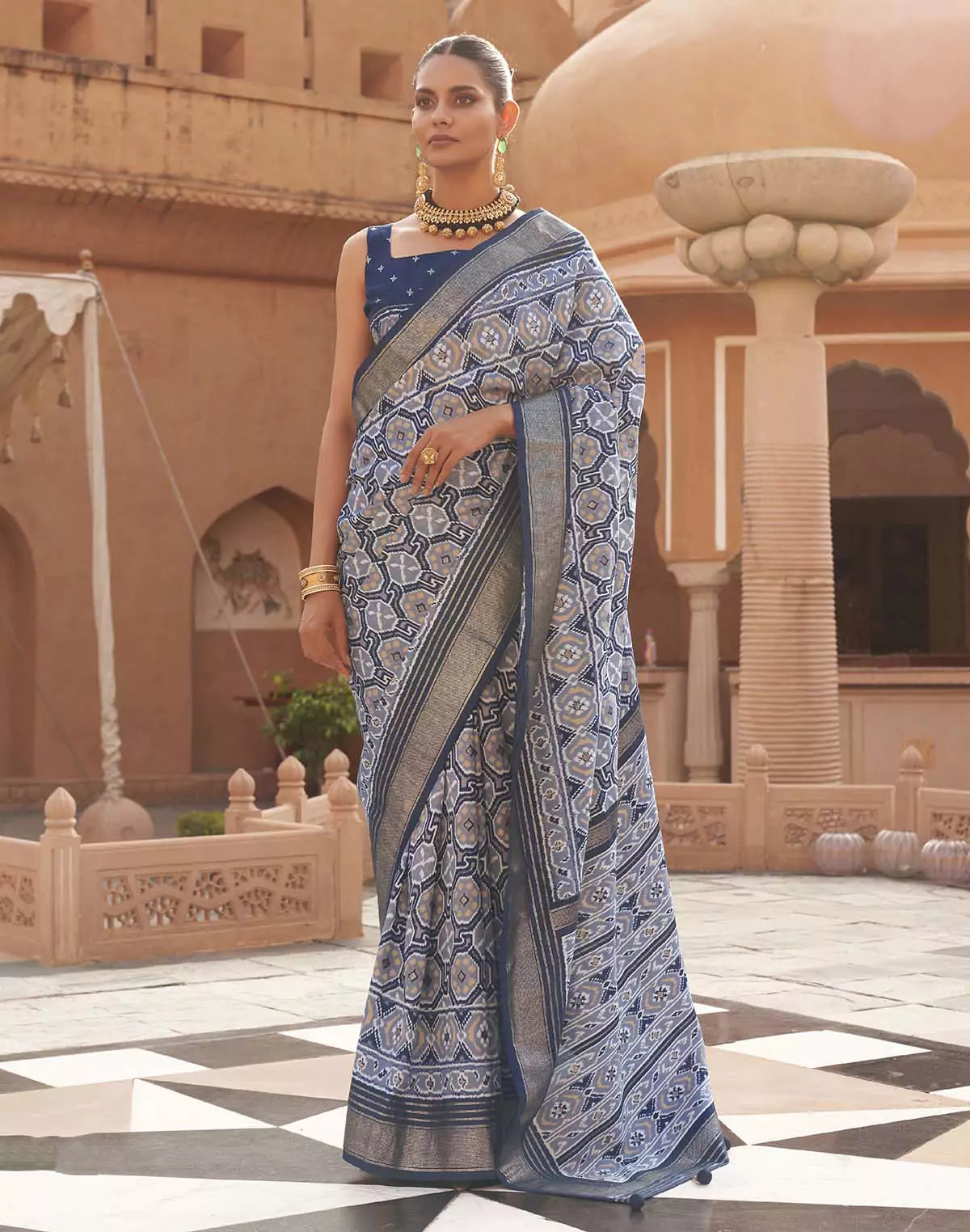 Image of Light Blue Ikat Pattern Pochampally Patola Silk Saree