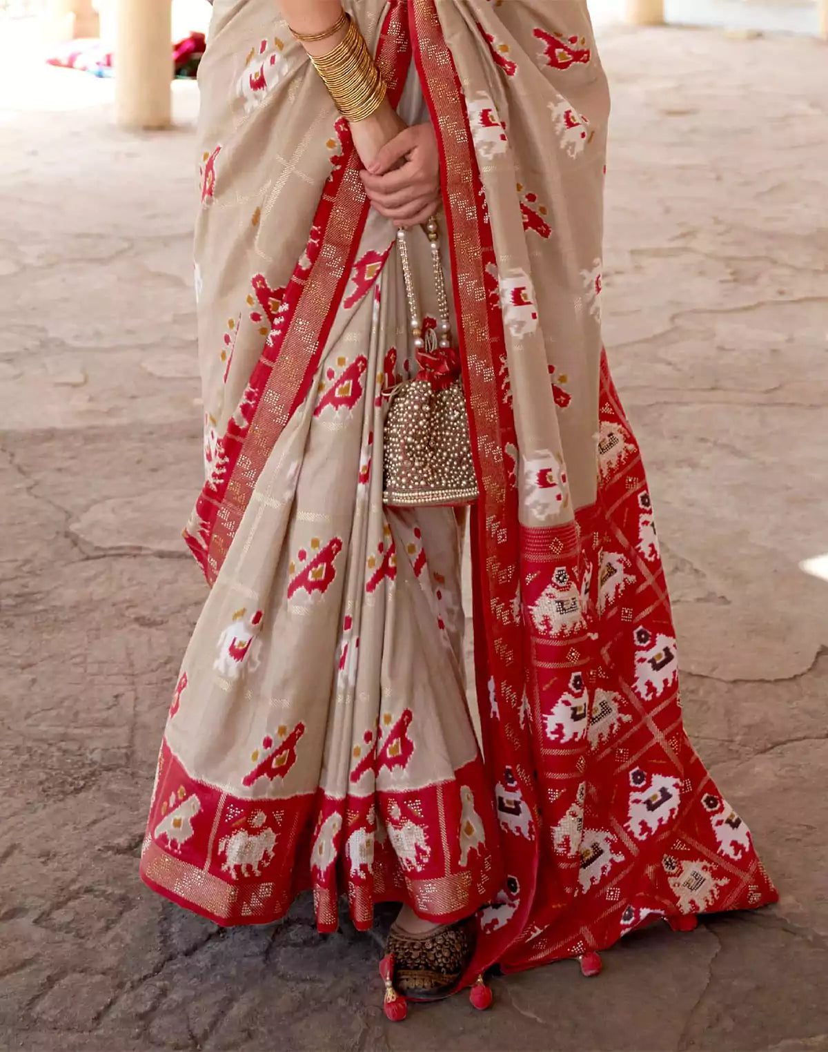 Image of Elegant Beige Woven Design Patola Saree