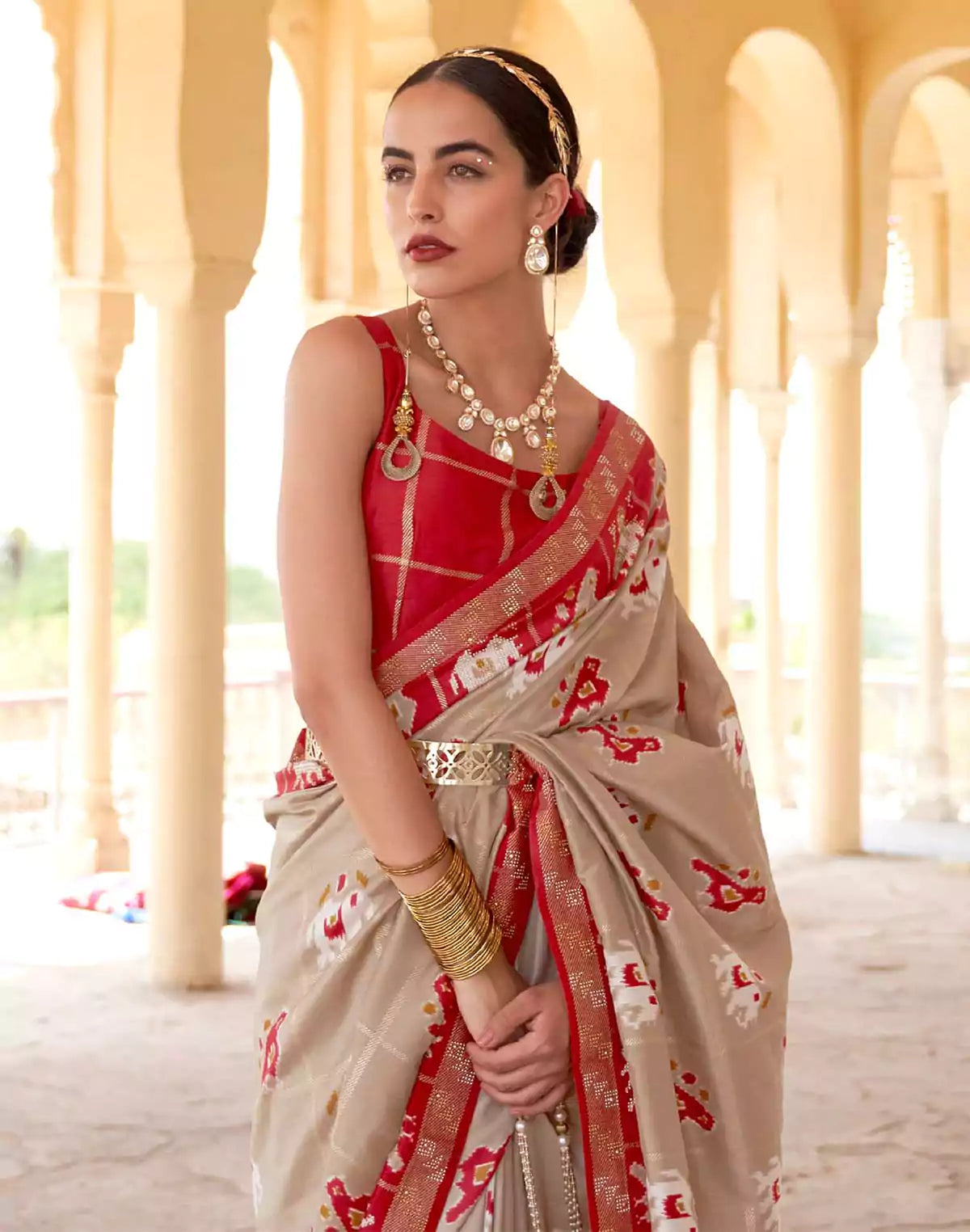 Image of Elegant Beige Woven Design Patola Saree