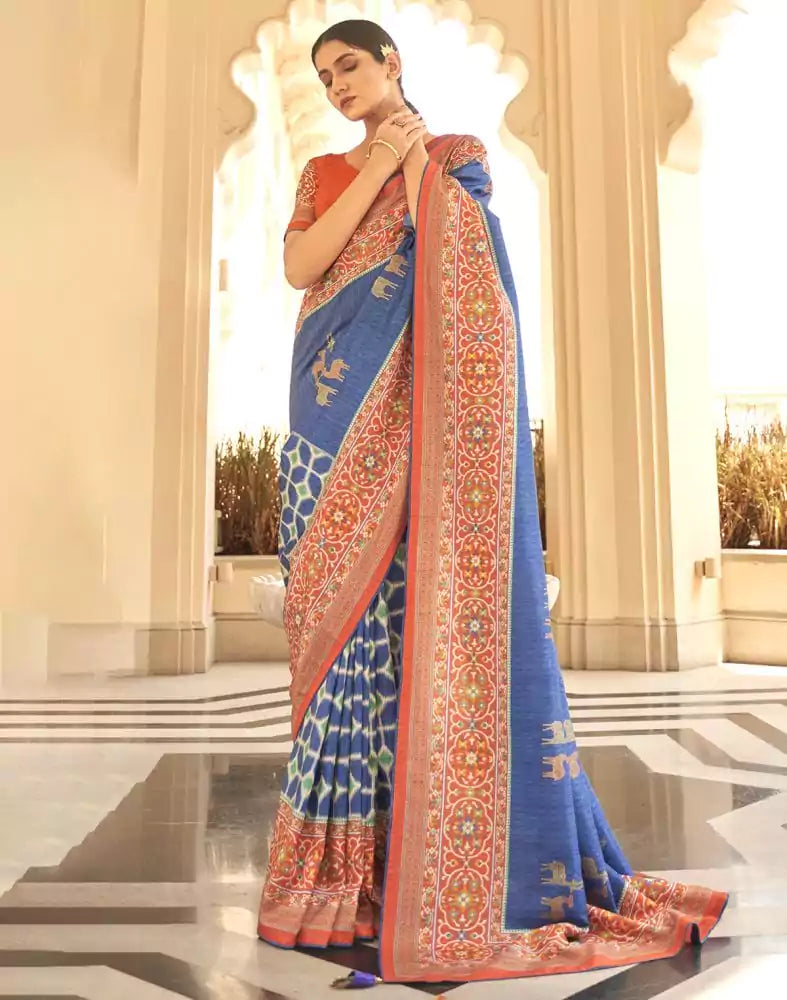 Image of Blue Ikat Print Dola Silk Fabric Saree