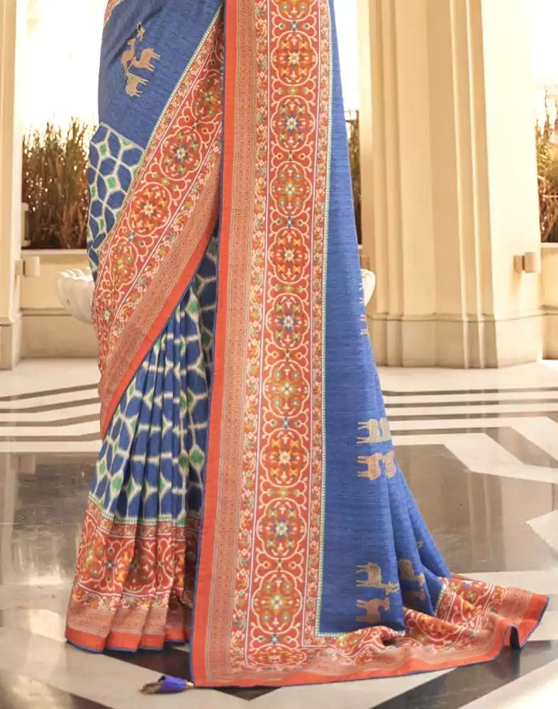 Image of Blue Ikat Print Dola Silk Fabric Saree