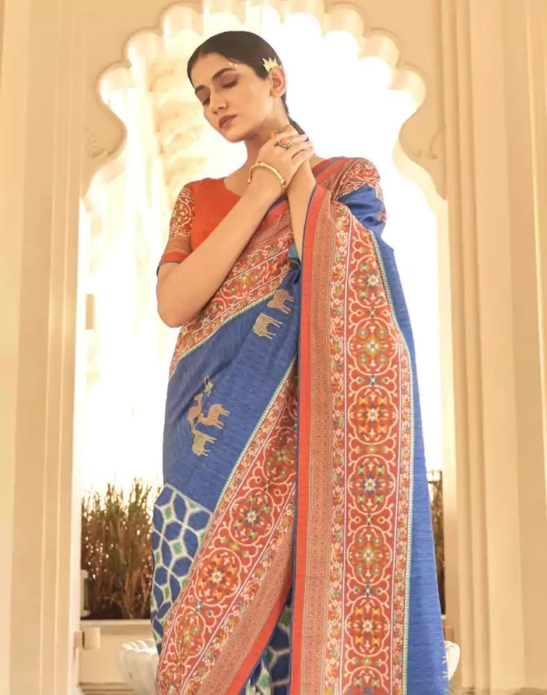 Image of Blue Ikat Print Dola Silk Fabric Saree