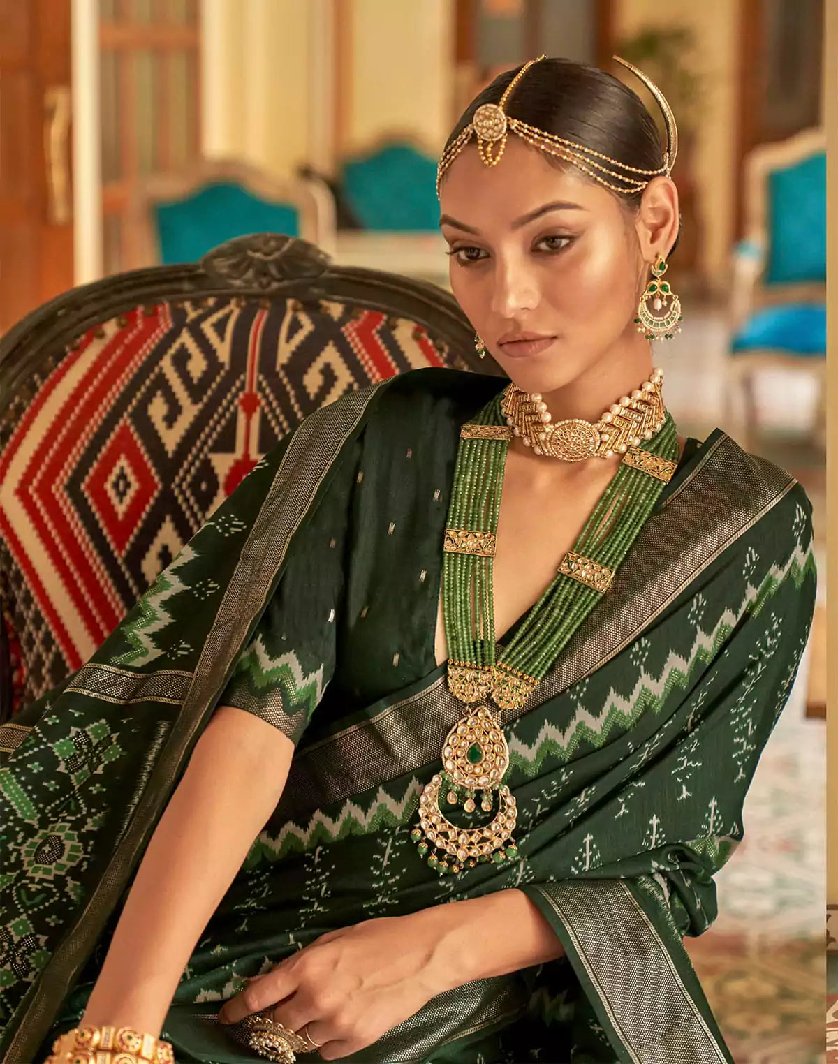 Image of Royal Dark Green Patola Silk Ikat Saree