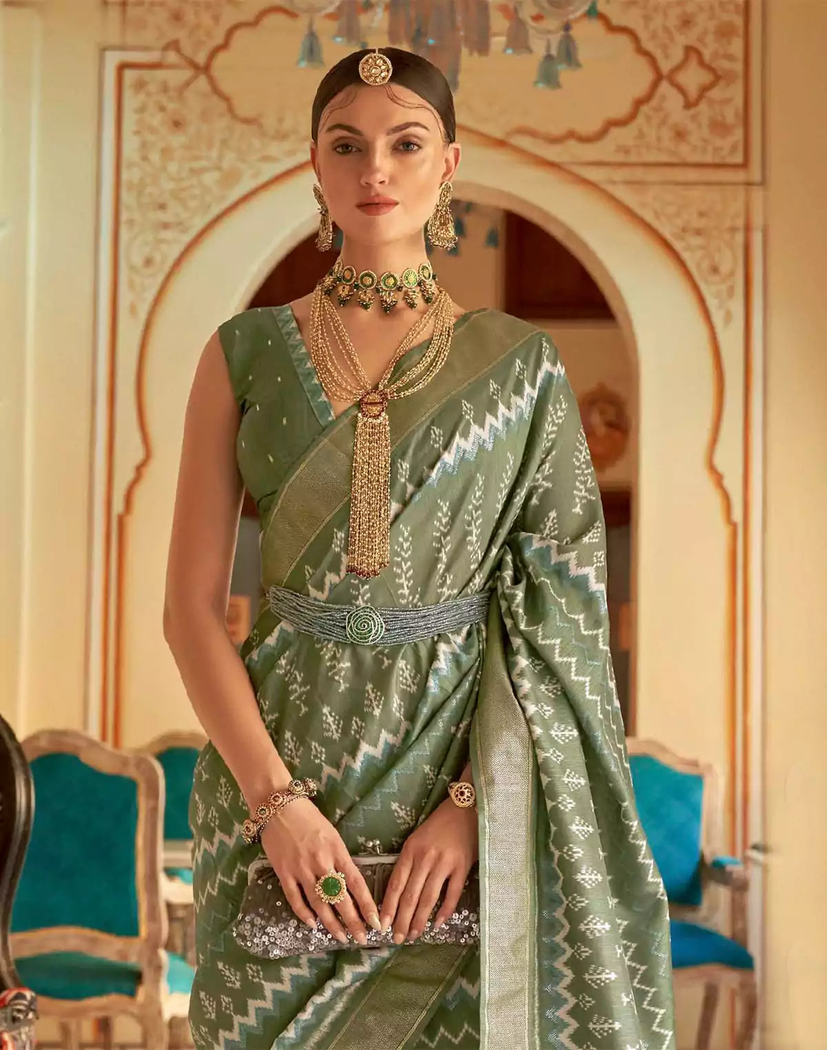 Image of Olive Green Ikat Print Patola Silk Saree