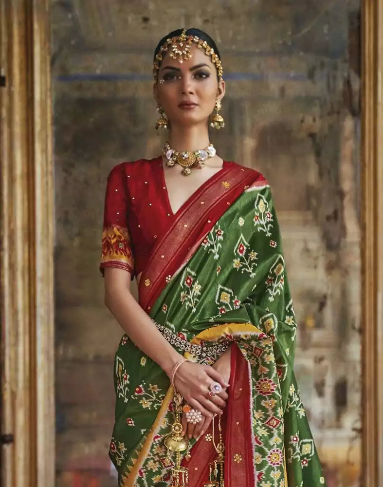 Image of Gorgeous Green Ikat Print Dola Silk Saree