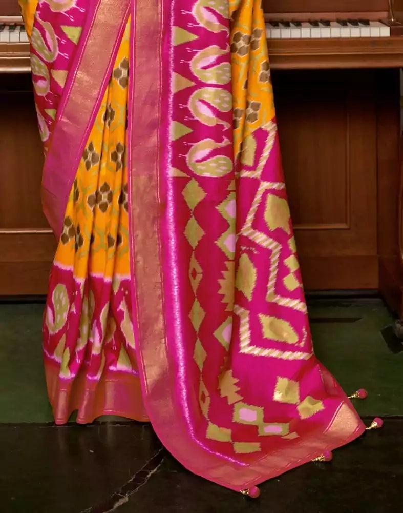 Image of Mustard and Pink Ikat Print Dola Silk Saree