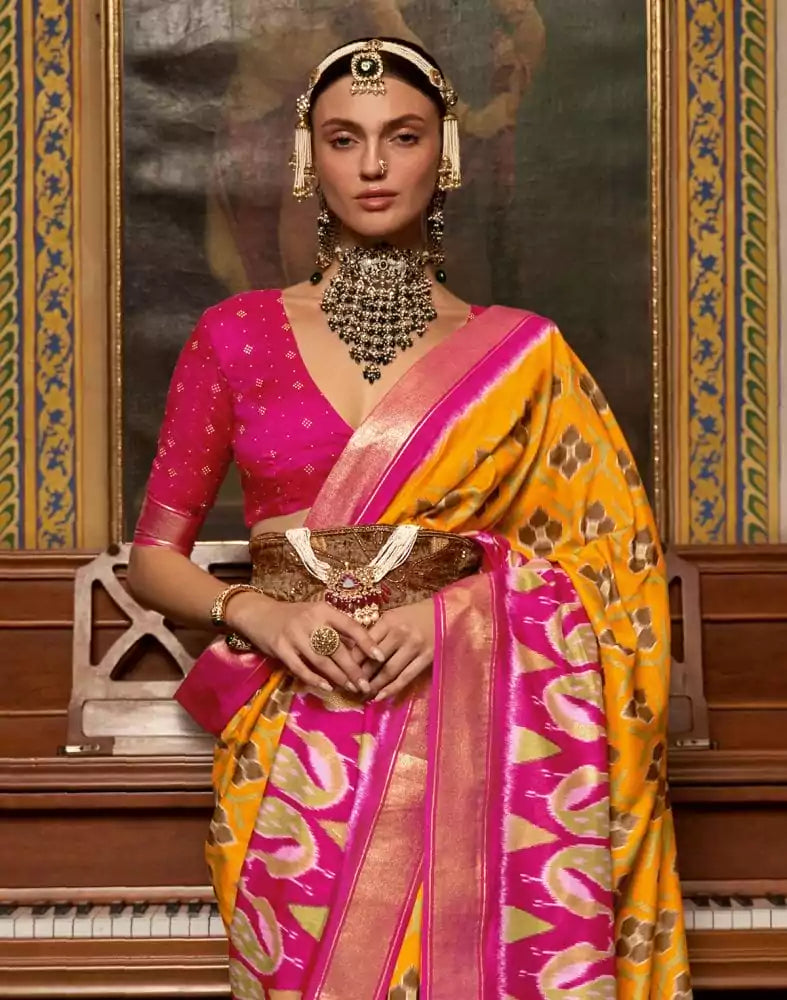 Image of Mustard and Pink Ikat Print Dola Silk Saree