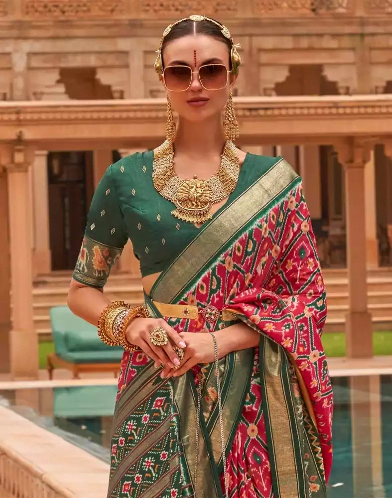 Image of Red and Green Ikat Print Patola Silk Saree
