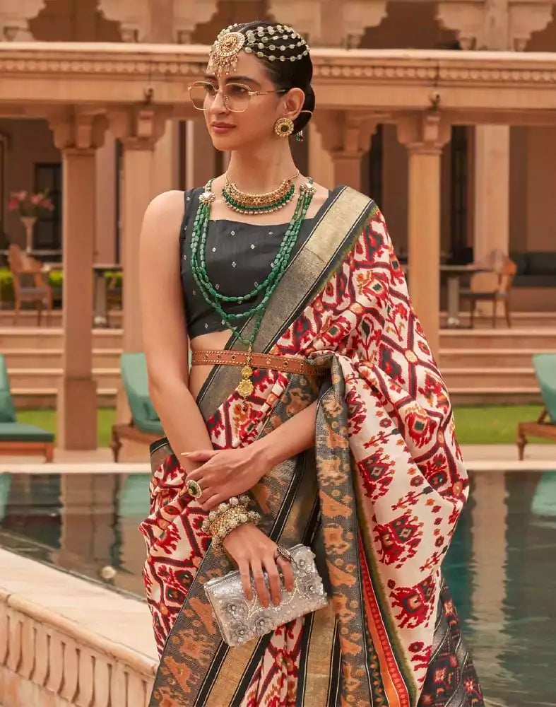 Image of Off White Ikat Print Patola Silk Saree