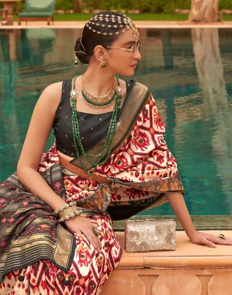 Image of Off White Ikat Print Patola Silk Saree