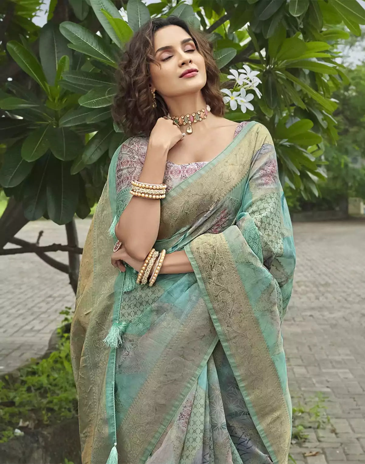 Image of Beautiful Sea Green Floral Designer Jute Saree