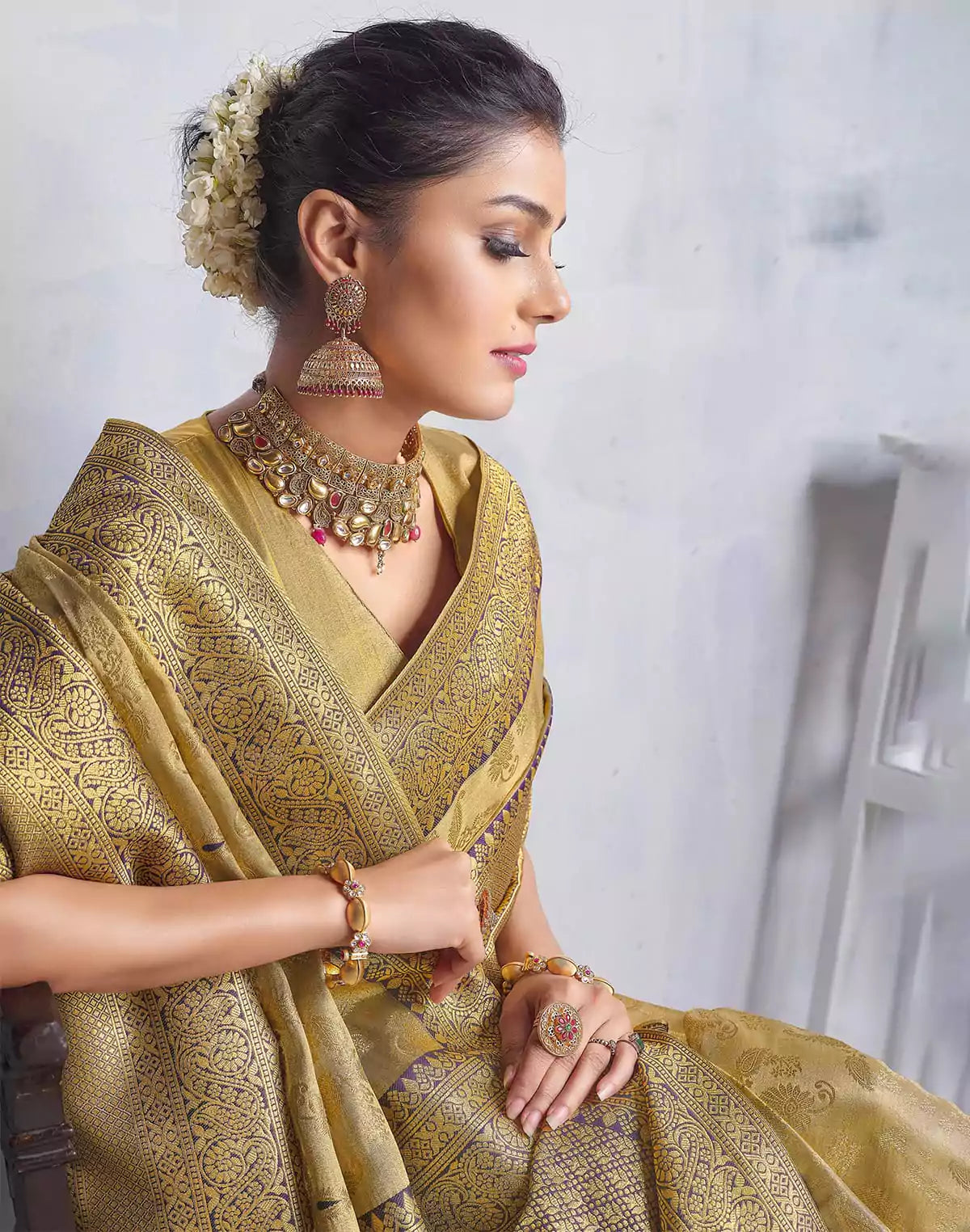 Image of Gold Coloured all over Paisely design Banaras Tissue Saree