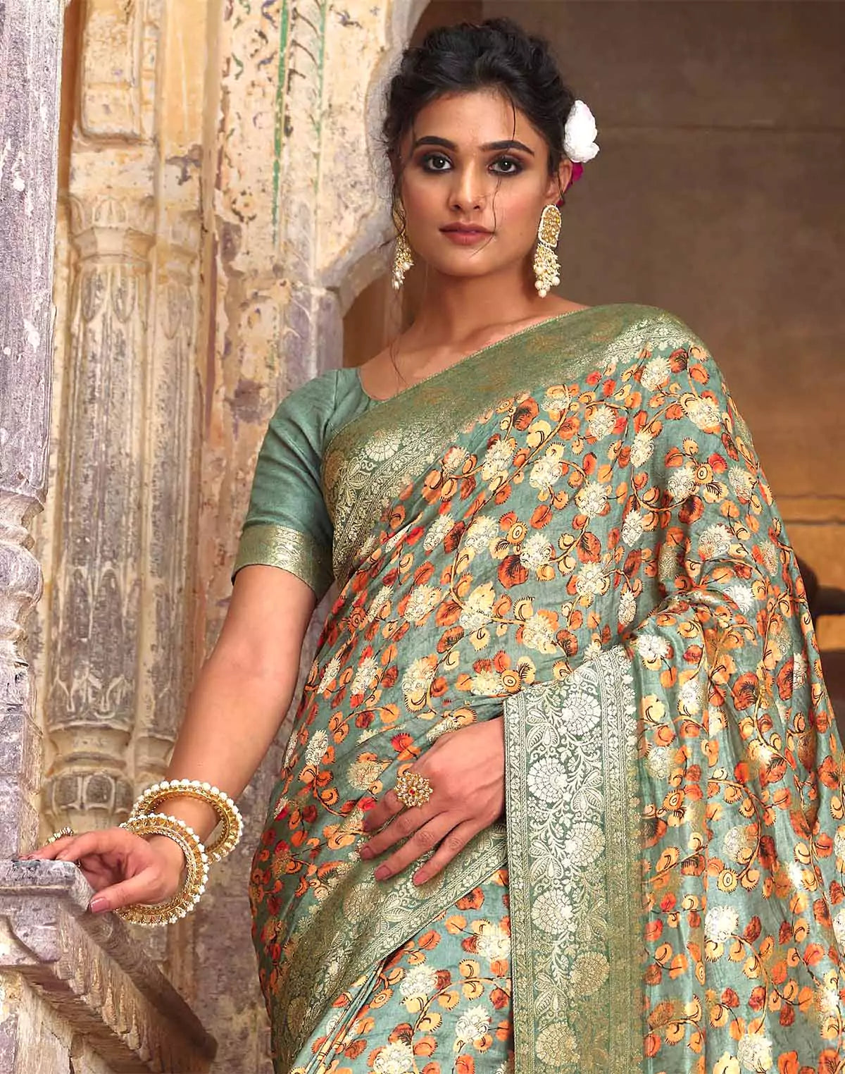 Image of Light Green Dola Silk all over Woven Zari and Floral Print Saree