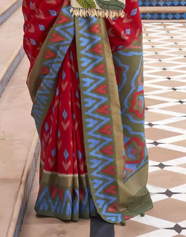 Image of Red and Green Ikat Print Dola Silk Saree