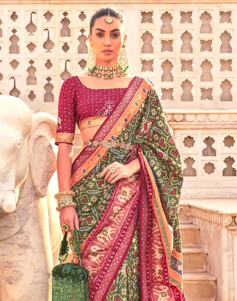 Image of Mehendi Green Ikat Print Patola Saree